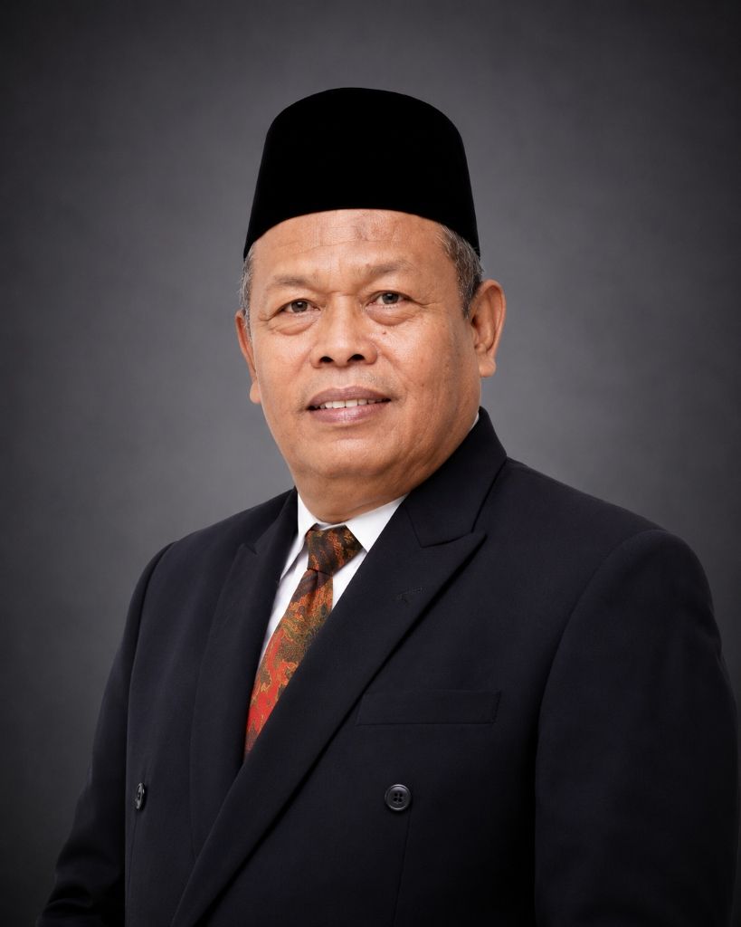 Dr. Ngatemin, M.Si.